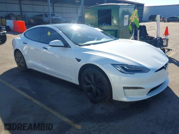 2021 Tesla Model S Long Range with VIN 5YJSA1E56MF453711, listed as a IAAI auction lot 41467603 with 115,634 mi miles and . Bid and sale history available at DreamBid. Image 1.