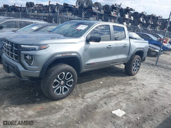 2024 GMC Canyon 4WD AT4 with VIN 1GTP6DEK6R1202153, listed as a IAAI auction lot 41583339 with 10,891 mi miles. Bid and sale history available at carsss.com. Image 2.