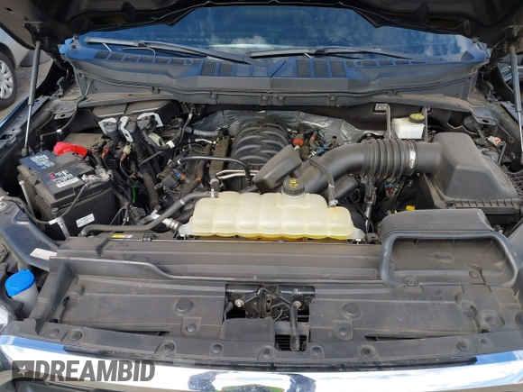 2022 Ford F-150 XL with VIN 1FTMF1E56NKE03194, listed as a IAAI auction lot 41620978 with 76,689 mi miles and . Bid and sale history available at DreamBid. Image 10.
