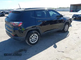 2018 Jeep Compass Sport with VIN 3C4NJCABXJT214907, listed as a IAAI auction lot 41814215 with 96,111 mi miles and . Bid and sale history available at DreamBid. Image 4.