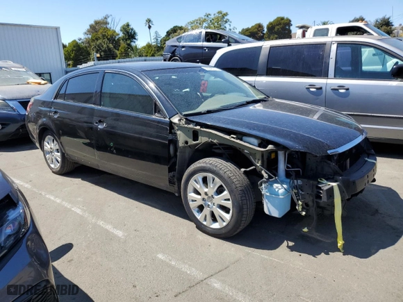 2010 Toyota Avalon XL with VIN 4T1BK3DB0AU358074, listed as a Copart auction lot 68949064 with 144,429 mi miles and Salvage Title. Bid and sale history available at carsss.com. Image 4.