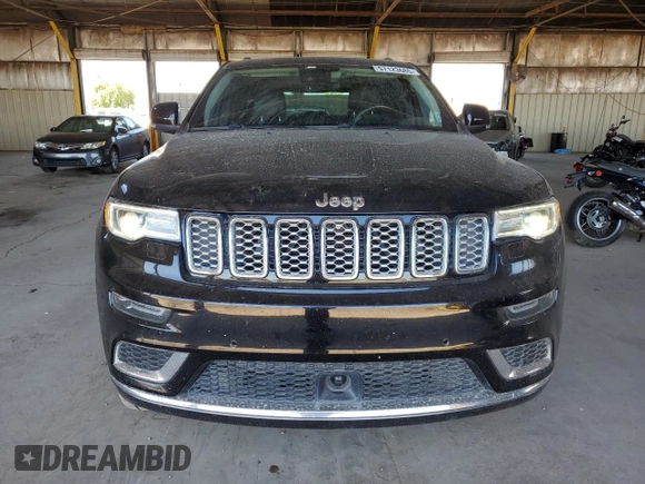 2018 Jeep Grand Cherokee Summit with VIN 1C4RJFJT4JC344141, listed as a Copart auction lot 57123685 with 86,893 mi miles and Salvage title. Bid and sale history available at DreamBid. Image 5.