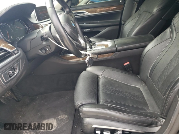 2016 BMW 7 Series 740i with VIN WBA7E2C57GG714631, listed as a Copart auction lot 67532853 with 83,230 mi miles. Bid and sale history available at carsss.com. Image 7.