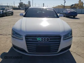 2015 Audi A8 с VIN WAUJGAFD3FN030568, выставлен на аукционе Copart как лот 75785923 с пробегом 83 911 миль миль и . История ставок и продаж доступна на DreamBid. Изображение 5.