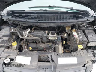 2007 Dodge Caravan SXT with VIN 1D4GP45R87B161237, listed as a IAAI auction lot 41594127 with 154,508 mi miles and . Bid and sale history available at DreamBid. Image 10.