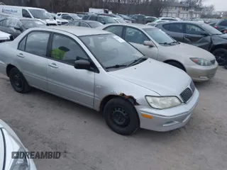 2002 Mitsubishi Lancer ES with VIN JA3AJ26E62U060214, listed as a IAAI auction lot 40961872 with 150,399 mi miles. Bid and sale history available at carsss.com. Image 1.