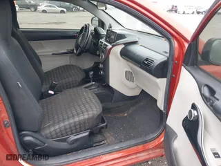 2012 Scion iQ with VIN JTNJJXB03CJ021023, listed as a IAAI auction lot 41487646 with 143,735 mi miles. Bid and sale history available at carsss.com. Image 5.