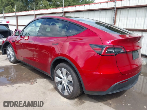 2024 Tesla Model Y Long Range with VIN 7SAYGDEE8RA283983, listed as a IAAI auction lot 39926362 with 1,999 mi miles. Bid and sale history available at carsss.com. Image 3.