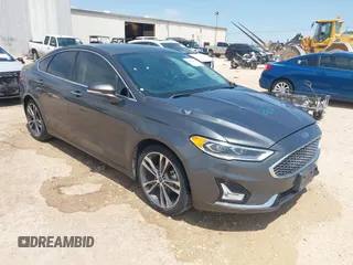 2020 Ford Fusion Titanium with VIN 3FA6P0D98LR117379, listed as a IAAI auction lot 42022438 with 72,267 mi miles and . Bid and sale history available at DreamBid. Image 1.