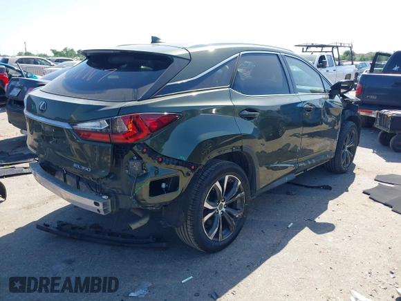 2021 Lexus RX 350 with VIN 2T2HZMAA2MC199129, listed as a IAAI auction lot 41990653 with 60,574 mi miles and . Bid and sale history available at DreamBid. Image 4.