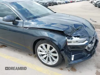 2018 Audi A5 Sportback Premium z VIN WAUANCF5XJA022221, wystawiony jako IAAI lot #42041410 z przebiegiem 94 851 mil mil oraz . Historia ofert i sprzedaży dostępna na DreamBid. Obrazek 6.