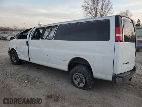 2014 Chevrolet Express Passenger LT with VIN 1GAZG1FGXE1187397, listed as a Copart auction lot 43209785 with 168,614 mi miles and Salvage title. Bid and sale history available at DreamBid. Image 2.