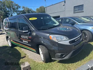 2021 Ram ProMaster City Passenger SLT with VIN ZFBHRFBB9M6T47066, listed as a Copart auction lot 82192084 with 129,171 mi miles and Clean Title. Bid and sale history available at carsss.com. Image 1.