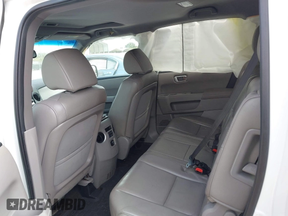 2013 Honda Pilot EX-L with VIN 5FNYF3H70DB043832, listed as a IAAI auction lot 40880885 with 250,712 mi miles and . Bid and sale history available at DreamBid. Image 8.