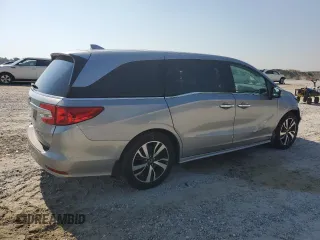 2018 Honda Odyssey Elite with VIN 5FNRL6H95JB062033, listed as a Copart auction lot 63732915 with 105,234 mi miles and Salvage title. Bid and sale history available at DreamBid. Image 3.