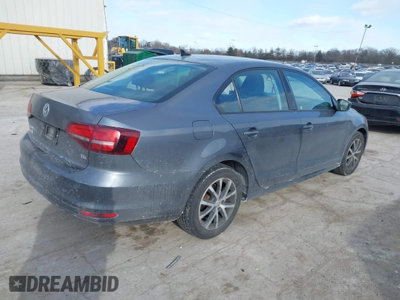 2016 Volkswagen Jetta Sedan 1.4T SE with VIN 3VWD67AJ7GM281671, listed as a IAAI auction lot 41385896 with 153,168 mi miles. Bid and sale history available at carsss.com. Image 4.