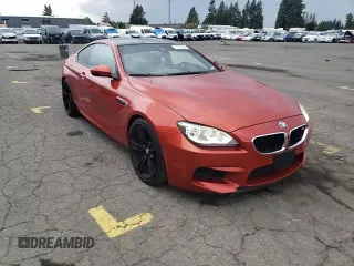 2014 BMW M6 z VIN WBSLX9C52ED160071, wystawiony jako Copart lot #77452554 z przebiegiem 64 814 mil mil oraz Szkoda całkowita • Salvage title. Historia ofert i sprzedaży dostępna na DreamBid. Obrazek 10.