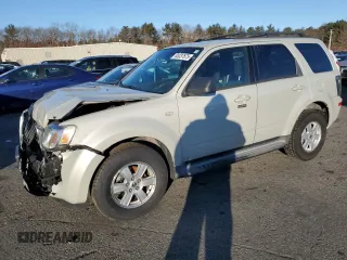 2009 Mercury Mariner with VIN 4M2CU81G99KJ02338, listed as a Copart auction lot 88337675 with 82,115 mi miles and Salvage title. Bid and sale history available at DreamBid. Image 1.