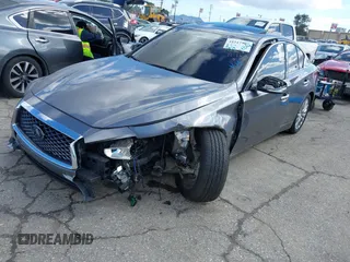 2019 Infiniti Q50 Luxe z VIN JN1EV7APXKM512617, wystawiony jako IAAI lot #41517907 z przebiegiem 46 619 mil mil oraz . Historia ofert i sprzedaży dostępna na DreamBid. Obrazek 2.