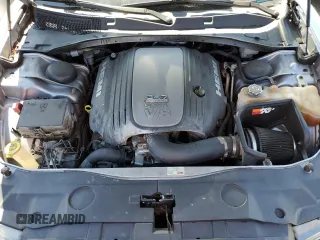 2014 Dodge Charger RT Plus with VIN 2C3CDXCT4EH307940, listed as a Copart auction lot 64035484 with 129,665 mi miles and Salvage Title. Bid and sale history available at carsss.com. Image 11.