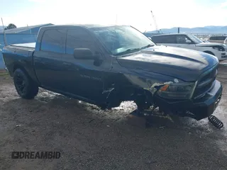 2012 Ram 1500 Tradesman with VIN 1C6RD7KP9CS232482, listed as a IAAI auction lot 41878529 with 107,410 mi miles and . Bid and sale history available at DreamBid. Image 1.