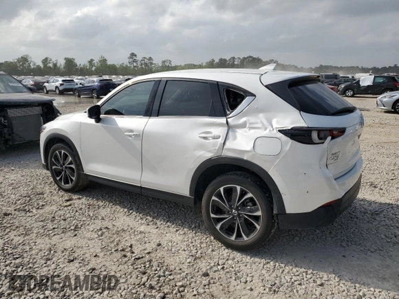 2023 Mazda CX-5 2.5 S Premium Package with VIN JM3KFBDM4P0131143, listed as a Copart auction lot 51627675 with 24,971 mi miles and Salvage Title. Bid and sale history available at carsss.com. Image 2.