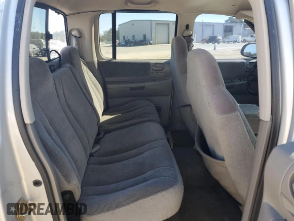2003 Dodge Dakota SLT with VIN 1D7HL48X33S340079, listed as a Copart auction lot 76516514 with 295,350 mi miles and Clean Title. Bid and sale history available at carsss.com. Image 10.