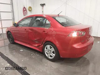 2015 Mitsubishi Lancer ES with VIN JA32U2FU0FU014418, listed as a IAAI auction lot 41489892 with 55,599 mi miles. Bid and sale history available at carsss.com. Image 3.