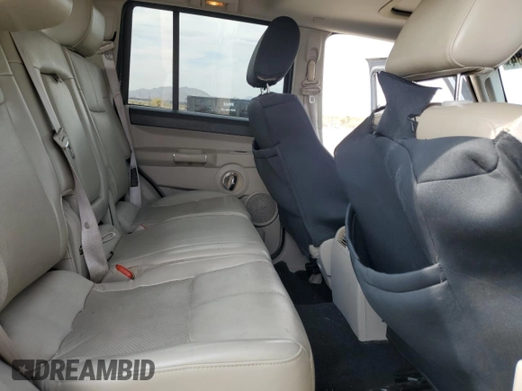2007 Jeep Commander Limited z VIN 1J8HH58N17C673664, wystawiony jako Copart lot #65282184 z przebiegiem 177 695 mil mil oraz Szkoda całkowita • Salvage title. Historia ofert i sprzedaży dostępna na DreamBid. Obrazek 11.