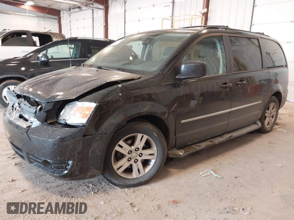 2010 Dodge Grand Caravan Crew with VIN 2D4RN6DX1AR438135, listed as a IAAI auction lot 41734378 with 57,041 mi miles and . Bid and sale history available at DreamBid. Image 2.