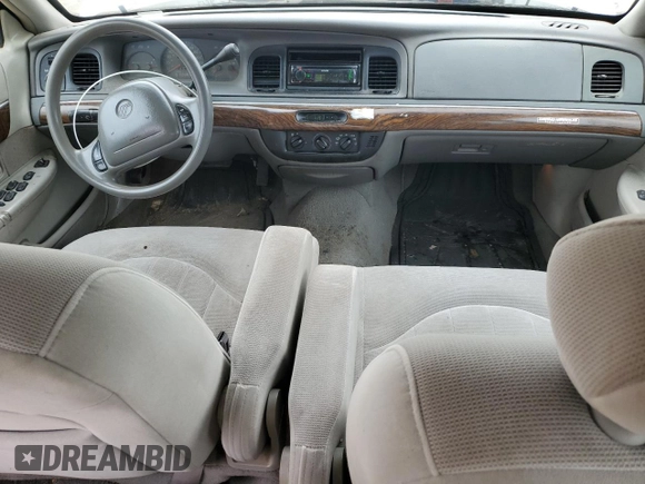 1999 Mercury Grand Marquis GS z VIN 2MEFM74W0XX670924, wystawiony jako Copart lot #51811055 z przebiegiem 176 559 mil mil oraz Szkoda całkowita • Salvage title. Historia ofert i sprzedaży dostępna na DreamBid. Obrazek 8.