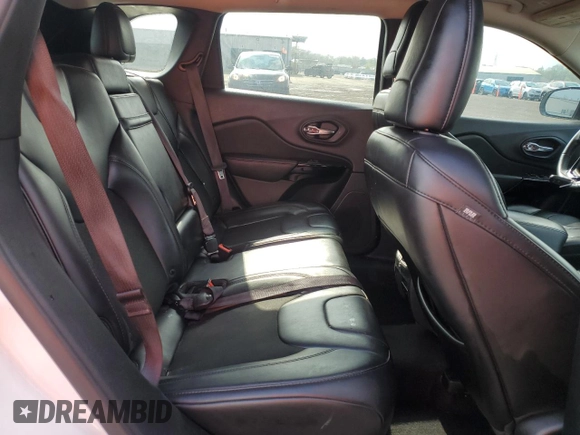 2019 Jeep Cherokee Altitude z VIN 1C4PJLLB7KD286063, wystawiony jako Copart lot #55282685 z przebiegiem 128 660 mil mil oraz Szkoda całkowita • Salvage title. Historia ofert i sprzedaży dostępna na DreamBid. Obrazek 11.