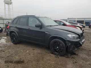 2012 BMW X5 M with VIN 5YMGY0C53CLK27448, listed as a Copart auction lot 80757454 with 146,435 mi miles and Salvage Title. Bid and sale history available at carsss.com. Image 4.