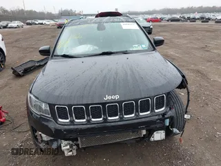 2019 Jeep Compass Latitude with VIN 3C4NJDBB3KT689174, listed as a IAAI auction lot 41843137 with 56,722 mi miles. Bid and sale history available at carsss.com. Image 12.