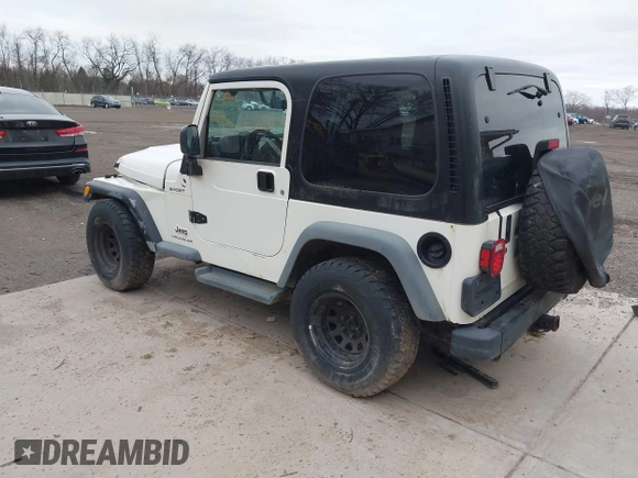 2005 Jeep Wrangler Sport with VIN 1J4FA49S25P352170, listed as a IAAI auction lot 41794958 with 154,304 mi miles. Bid and sale history available at carsss.com. Image 3.