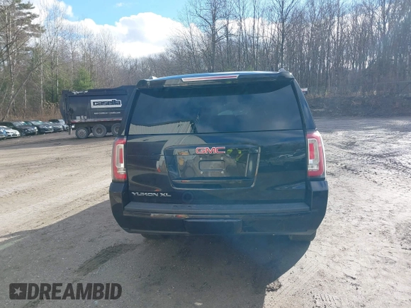 2015 GMC Yukon XL SLT with VIN 1GKS2HKC9FR159164, listed as a IAAI auction lot 41235420 with 136,730 mi miles. Bid and sale history available at carsss.com. Image 16.