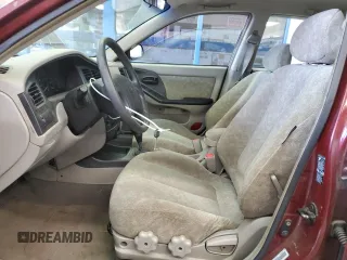 2001 Hyundai Elantra GLS with VIN KMHDN45D71U140221, listed as a Copart auction lot 54695955 with 107,725 mi miles and Salvage title. Bid and sale history available at DreamBid. Image 7.