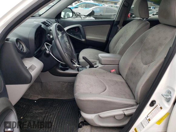 2009 Toyota RAV4 with VIN JTMBF33V49D017048, listed as a Copart auction lot 53561765 with 165,735 mi miles and Salvage Title. Bid and sale history available at carsss.com. Image 7.