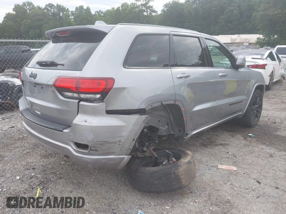 2018 Jeep Grand Cherokee Laredo E z VIN 1C4RJEAG5JC404022, wystawiony jako IAAI lot #42586412 z przebiegiem 95 798 mil mil oraz . Historia ofert i sprzedaży dostępna na DreamBid. Obrazek 4.