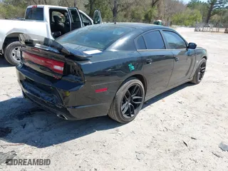 2013 Dodge Charger RT Plus with VIN 2C3CDXCT0DH616853, listed as a IAAI auction lot 41897577 with 171,503 mi miles. Bid and sale history available at carsss.com. Image 4.