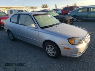 2004 Hyundai Accent GL with VIN KMHCG35C44U284868, listed as a Copart auction lot 74054884 with 87,259 mi miles and Clean Title. Bid and sale history available at carsss.com. Image 4.