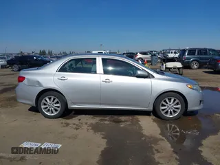 2010 Toyota Corolla with VIN 1NXBU4EE5AZ260859, listed as a IAAI auction lot 41647848 with 129,074 mi miles and . Bid and sale history available at DreamBid. Image 13.