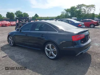 2014 Audi S6 Prestige z VIN WAUF2AFC9EN058417, wystawiony jako IAAI lot #42236333 z przebiegiem 58 257 mil mil oraz . Historia ofert i sprzedaży dostępna na DreamBid. Obrazek 3.