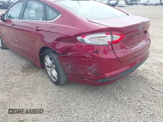 2015 Ford Fusion SE with VIN 1FA6P0H77F5123352, listed as a IAAI auction lot 42555351 with 185,134 mi miles and . Bid and sale history available at DreamBid. Image 6.