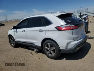 2020 Ford Edge SEL с VIN 2FMPK3J9XLBA54895, выставлен на аукционе Copart как лот 54101945 с пробегом Не указан миль и Списание • Salvage title. История ставок и продаж доступна на DreamBid. Изображение 2.