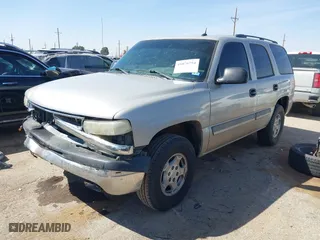 2005 Chevrolet Tahoe LS with VIN 1GNEC13V25R270657, listed as a IAAI auction lot 41876754 with 338,698 mi miles. Bid and sale history available at carsss.com. Image 2.