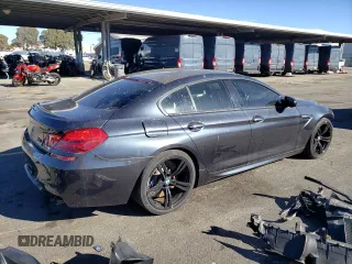 2015 BMW M6 z VIN WBS6C9C5XFD467854, wystawiony jako Copart lot #78871744 z przebiegiem 55 789 mil mil oraz Szkody całkowita. Historia ofert i sprzedaży dostępna na DreamBid. Obrazek 3.