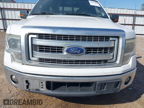 2014 Ford F-150 XL with VIN 1FTFW1CTXEFC12946, listed as a IAAI auction lot 41814929 with 230,328 mi miles. Bid and sale history available at carsss.com. Image 12.