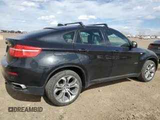 2012 BMW X6 50i z VIN 5UXFG8C59CLZ97450, wystawiony jako Copart lot #55281205 z przebiegiem 188 625 mil mil oraz Czysty tytuł • Clean title. Historia ofert i sprzedaży dostępna na DreamBid. Obrazek 3.