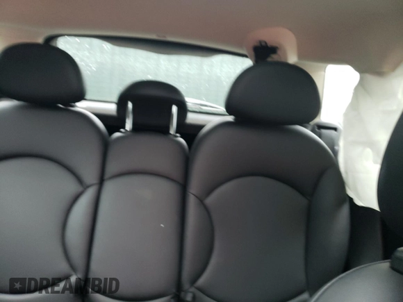 2014 MINI Countryman S with VIN WMWZC3C52EWP25379, listed as a Copart auction lot 61438355 with 76,943 mi miles and Salvage title. Bid and sale history available at DreamBid. Image 10.